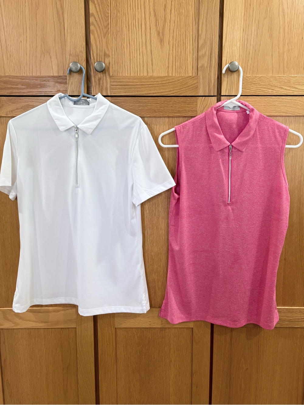 Callaway Women’s golf shirts. One white short sleeve, one pink/coral sleeveless.